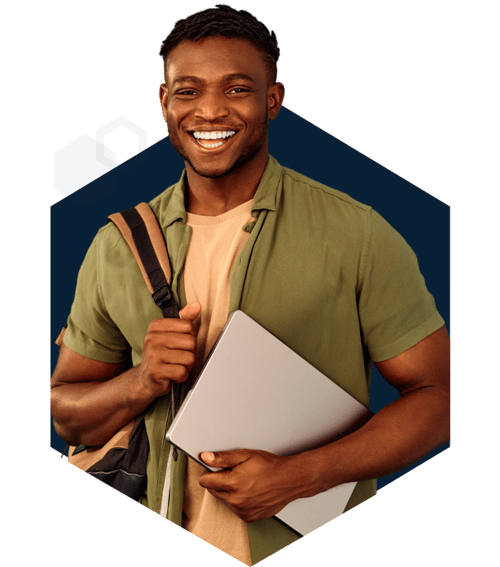 student holding laptop