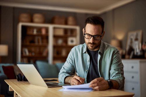 Tutor editing a paper.