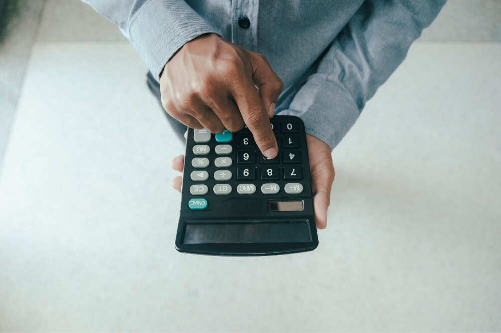 Med Student Using A Calculator