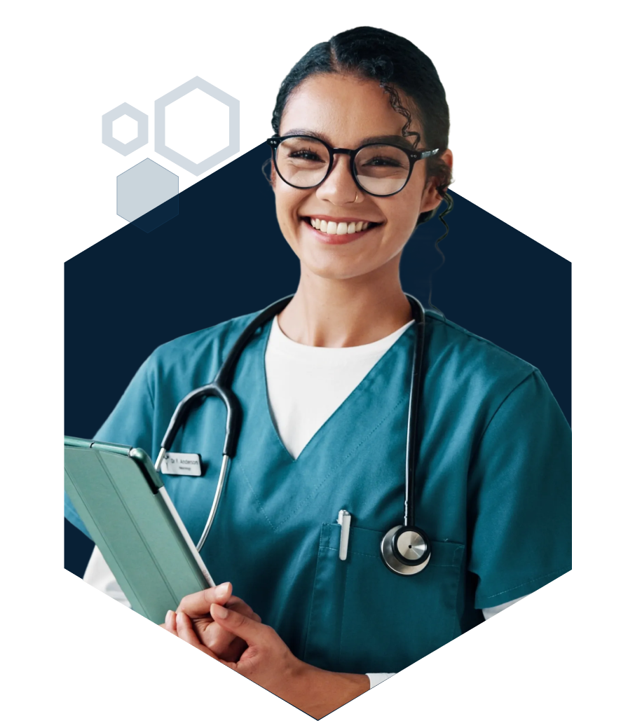 Woman wearing blue scrubs and carrying a notepad